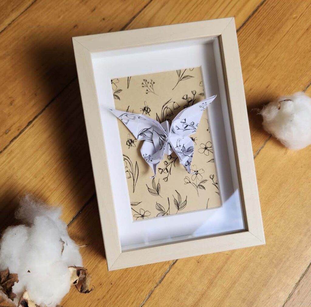 Paper craft butterfly in a frame