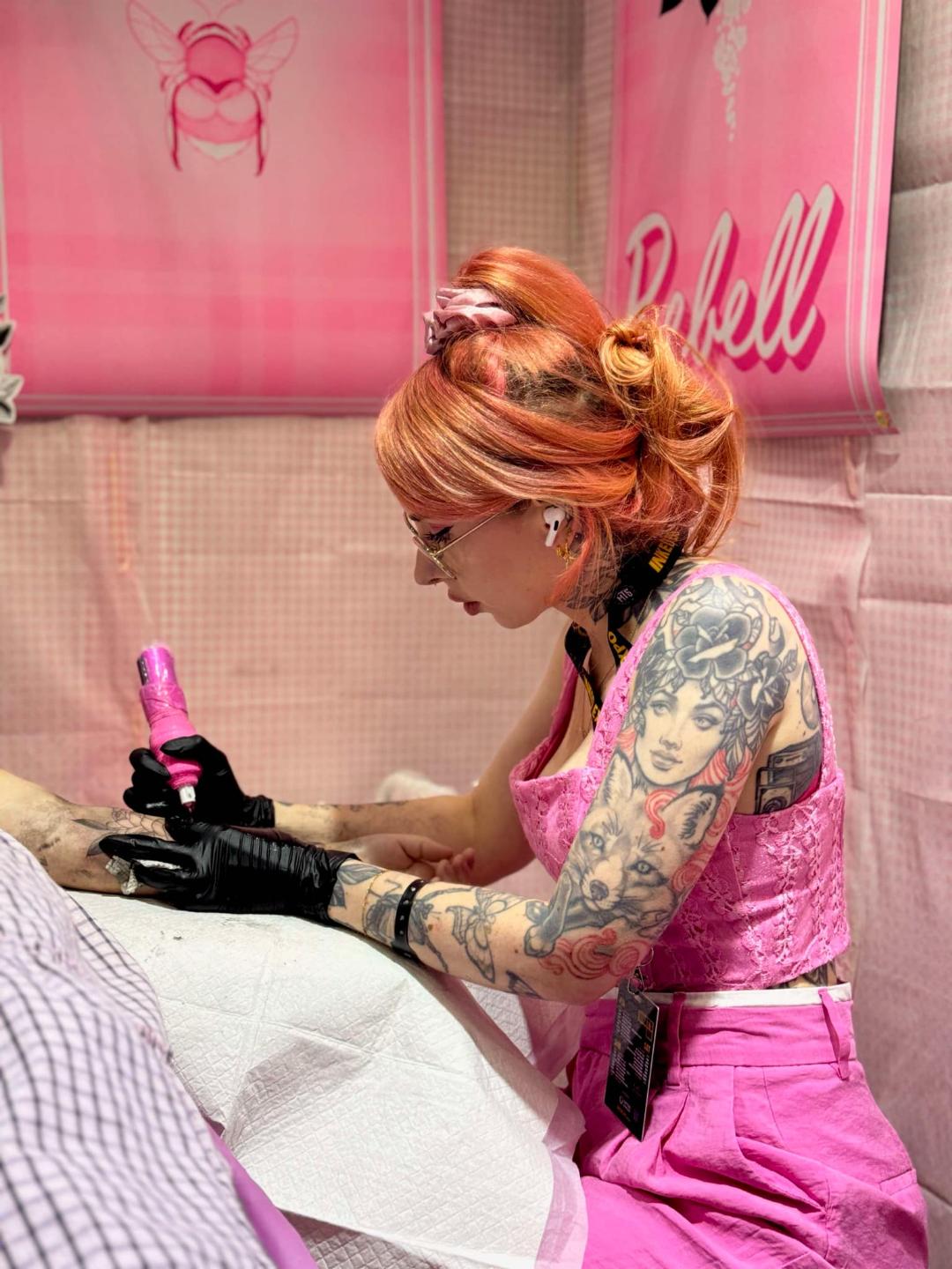 Jessica tattoos at a convention